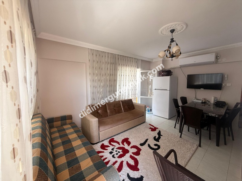 DİDİM ÇAMLIK MAHALLESİ’NDE  DENİZE YÜRÜME MESAFESİNDE 2+1 YOL CEPHELİ 2. KAT SATILIK DAİRE! 