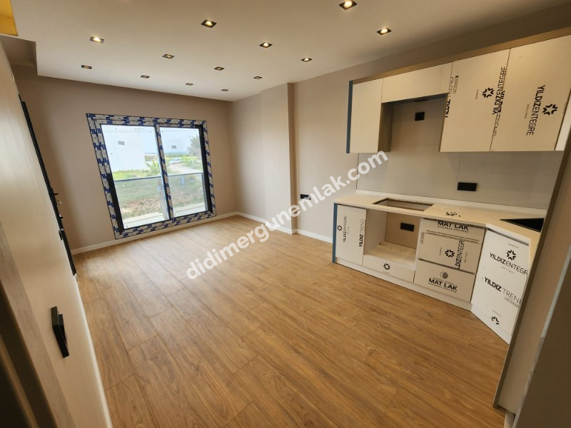 DİDİM HİSAR MAHALLESİ BULVAR ÜZERİNDE ULTRA LÜKS 2+1 – DÜKKAN ÜSTÜ 2. KAT ASANSÖRLÜ SATILIK DAİRE!