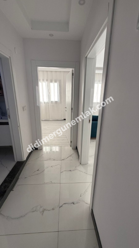DİDİM HİSAR MAHALLESİ’NDE EŞYALI 2+1 YÜKSEK ZEMİN KAT SATILIK DAİRE!