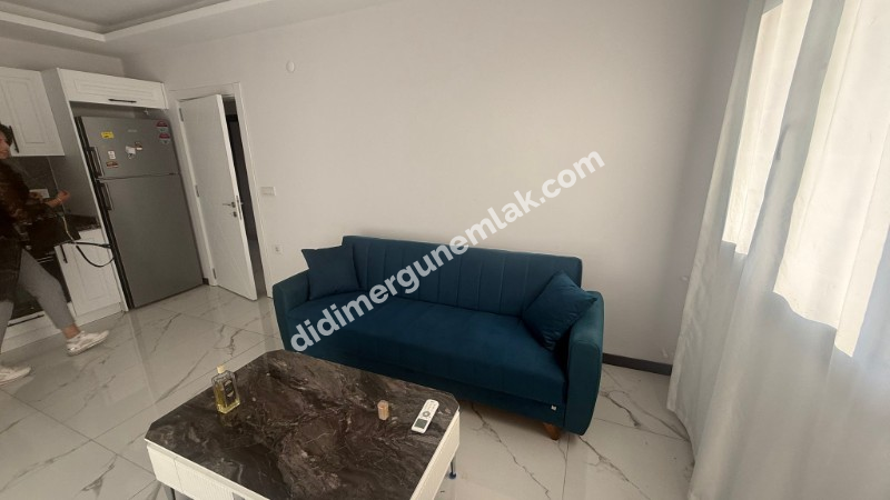 DİDİM HİSAR MAHALLESİ’NDE EŞYALI 2+1 YÜKSEK ZEMİN KAT SATILIK DAİRE!