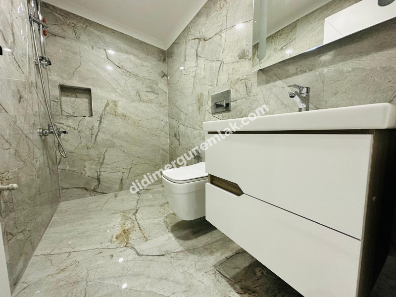 DİDİM HİSAR MAHALLESİ’NDE 3+1 • 140m² NET • 3 BANYO • TERASLI & PERGULELİ • İSKANLI SATILIK MODERN VİLLA! 