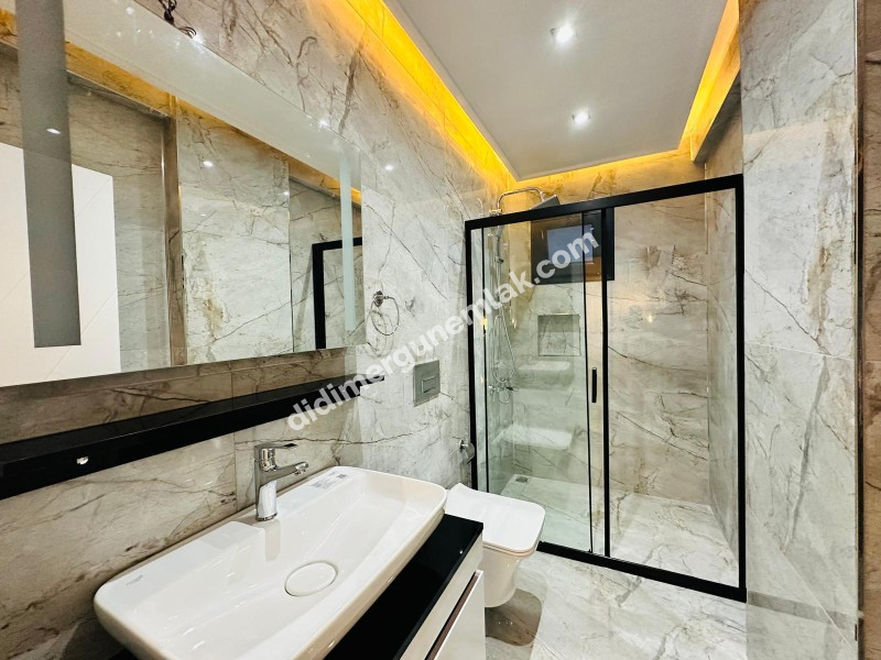 DİDİM HİSAR MAHALLESİ’NDE 3+1 • 140m² NET • 3 BANYO • TERASLI & PERGULELİ • İSKANLI SATILIK MODERN VİLLA! 
