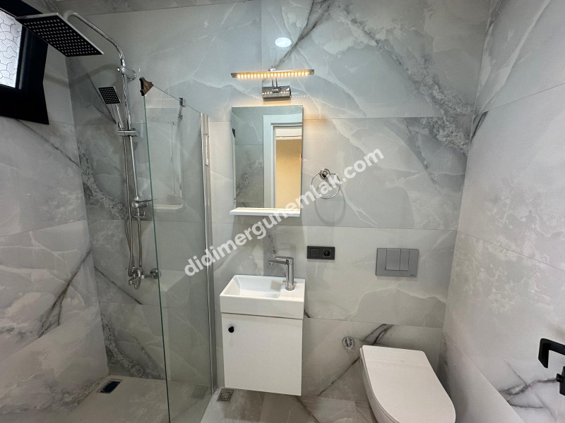 DİDİM HİSAR MAHALLESİ’NDE 3+1 • EBEVEYN BANYOLU • HAVUZLU • OTOPARKLI • 140m² NET SATILIK MODERN VİLLA!