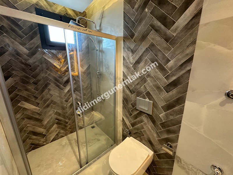 DİDİM HİSAR MAHALLESİ’NDE 3+1 • EBEVEYN BANYOLU • HAVUZLU • OTOPARKLI • 140m² NET SATILIK MODERN VİLLA!