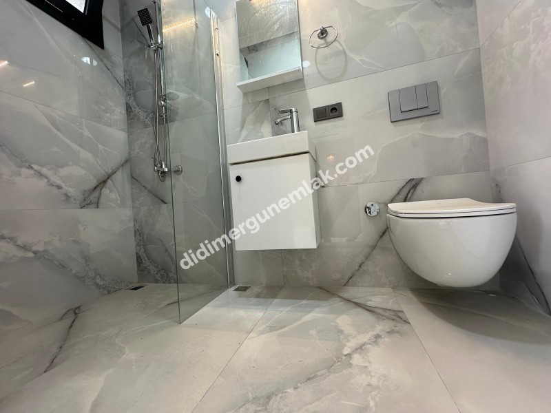 DİDİM HİSAR MAHALLESİ’NDE 3+1 • EBEVEYN BANYOLU • HAVUZLU • OTOPARKLI • 140m² NET SATILIK MODERN VİLLA!