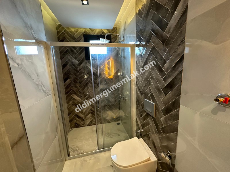 DİDİM HİSAR MAHALLESİ’NDE 3+1 • EBEVEYN BANYOLU • HAVUZLU • OTOPARKLI • 140m² NET SATILIK MODERN VİLLA!