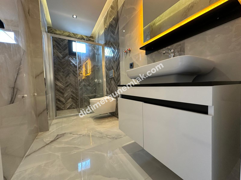 DİDİM HİSAR MAHALLESİ’NDE 3+1 • EBEVEYN BANYOLU • HAVUZLU • OTOPARKLI • 140m² NET SATILIK MODERN VİLLA!
