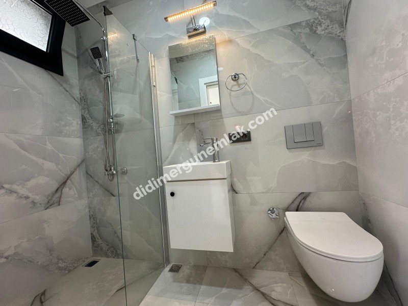 DİDİM HİSAR MAHALLESİ’NDE 3+1 • EBEVEYN BANYOLU • HAVUZLU • OTOPARKLI • 140m² NET SATILIK MODERN VİLLA!