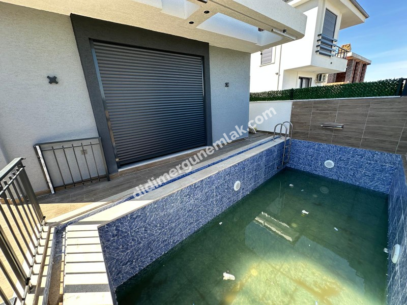 DİDİM HİSAR MAHALLESİ’NDE 3+1 • HAVUZLU • OTOPARKLI • FULL EŞYALI • PANJURLU • BİTİŞİK NİZAM SATILIK MODERN VİLLA!