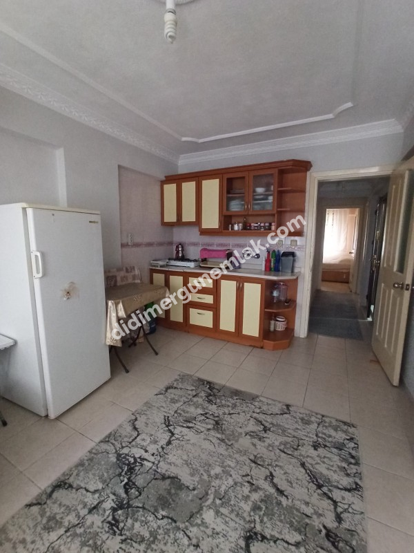 DİDİM ÇAMLIK MAHALLESİ’NDE NAZİLLİ KASAP YANI | FULL EŞYALI | KLİMALI | AÇIK MUTFAK | GENİŞ BALKONLU | FERAH ODALI 65m² 2+1 FIRSAT DAİRE! 