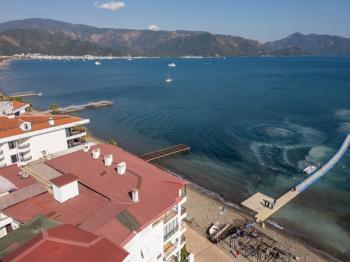 Marmaris Siteler Sahilde | Kendine Ait Plajlı Sitede | Deniz Manzaralı 1+1 Satılık Daire