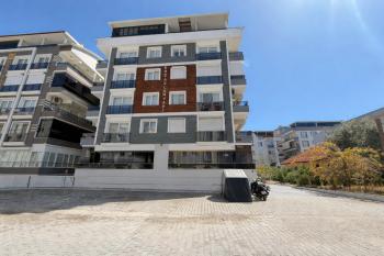 DİDİM YENİ MAHALLE’DE 115M² NET ALANA SAHİP 3+1 AYRI MUTFAKLI, ÖNÜ OTOPARKLI GENİŞ VE FERAH ODALI, BALKONLU ARA KAT SATILIK DAİRE