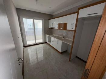 DİDİM YENİ MAHALLE’DE 115M² NET ALANA SAHİP 3+1 AYRI MUTFAKLI, ÖNÜ OTOPARKLI GENİŞ VE FERAH ODALI, BALKONLU ARA KAT SATILIK DAİRE