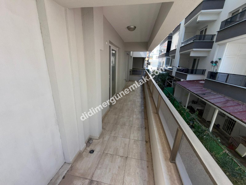 DİDİM YENİ MAHALLE’DE 115M² NET ALANA SAHİP 3+1 AYRI MUTFAKLI, ÖNÜ OTOPARKLI GENİŞ VE FERAH ODALI, BALKONLU ARA KAT SATILIK DAİRE