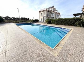 KKTC Girne Lapta The Cove Sitesi Satılık Bahçeli 2+1 Fırsat Daire