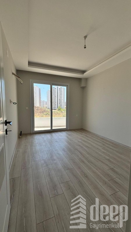 GENİŞ OTURUMLU YENİ BİNADA 1+1 SATILIK DAİRE