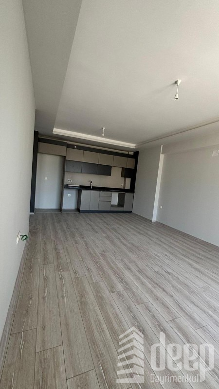 GENİŞ OTURUMLU YENİ BİNADA 1+1 SATILIK DAİRE