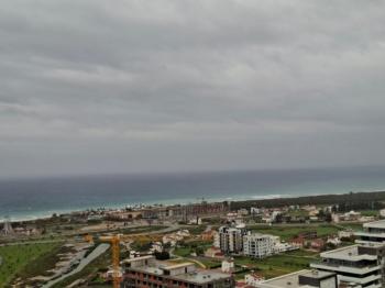 İSKEKLE LONGBEACH BÖLGESİNDE 7 YILDIZLI REZİDANS İLE OTEL KONSEPTLİ SATILIK 2+1 DAİRE