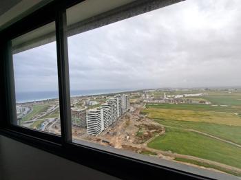 İSKEKLE LONGBEACH BÖLGESİNDE 7 YILDIZLI REZİDANS İLE OTEL KONSEPTLİ SATILIK 2+1 DAİRE