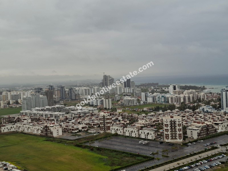 İSKEKLE LONGBEACH BÖLGESİNDE 7 YILDIZLI REZİDANS İLE OTEL KONSEPTLİ SATILIK 2+1 DAİRE