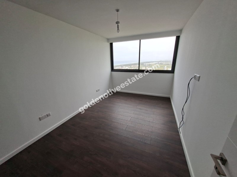 İSKEKLE LONGBEACH BÖLGESİNDE 7 YILDIZLI REZİDANS İLE OTEL KONSEPTLİ SATILIK 2+1 DAİRE