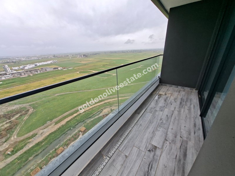 İSKEKLE LONGBEACH BÖLGESİNDE 7 YILDIZLI REZİDANS İLE OTEL KONSEPTLİ SATILIK 2+1 DAİRE