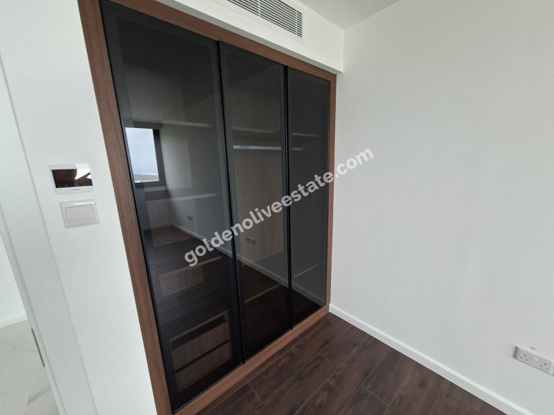 İSKEKLE LONGBEACH BÖLGESİNDE 7 YILDIZLI REZİDANS İLE OTEL KONSEPTLİ SATILIK 2+1 DAİRE