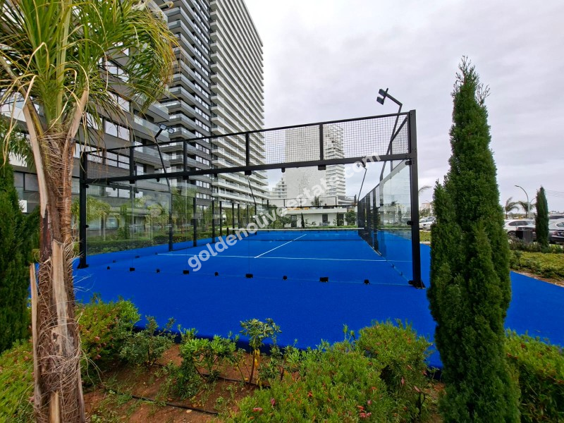 İSKEKLE LONGBEACH BÖLGESİNDE 7 YILDIZLI REZİDANS İLE OTEL KONSEPTLİ SATILIK 2+1 DAİRE