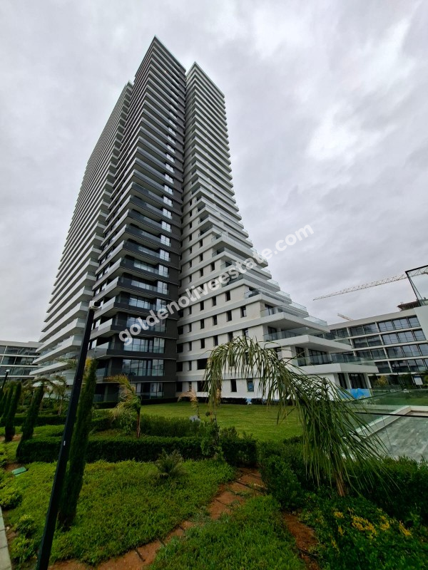 İSKEKLE LONGBEACH BÖLGESİNDE 7 YILDIZLI REZİDANS İLE OTEL KONSEPTLİ SATILIK 2+1 DAİRE