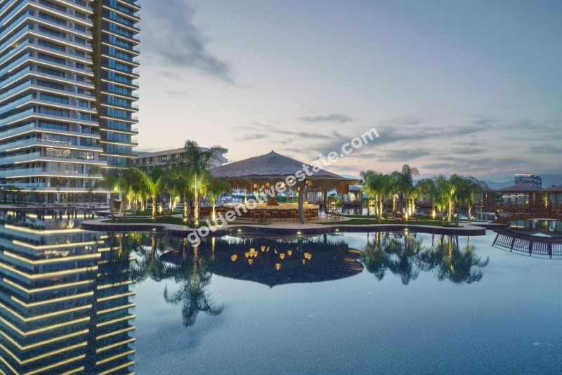 İSKEKLE LONGBEACH BÖLGESİNDE 7 YILDIZLI REZİDANS İLE OTEL KONSEPTLİ SATILIK 2+1 DAİRE