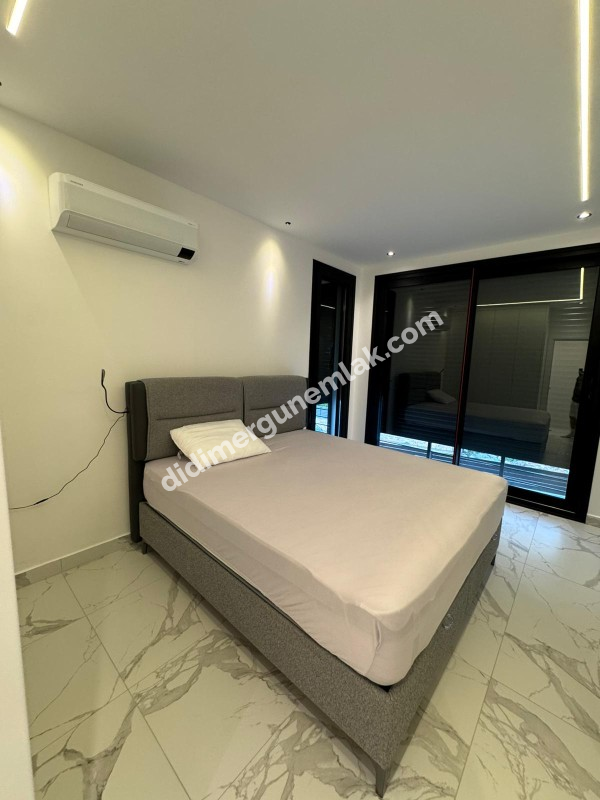  DİDİM ALTINKUM MAHALLESİNDE DENİZE 300 METRE MESAFEDE 3+1 LÜKS SIFIR EŞYALI SATILIK İKİZ VİLLA