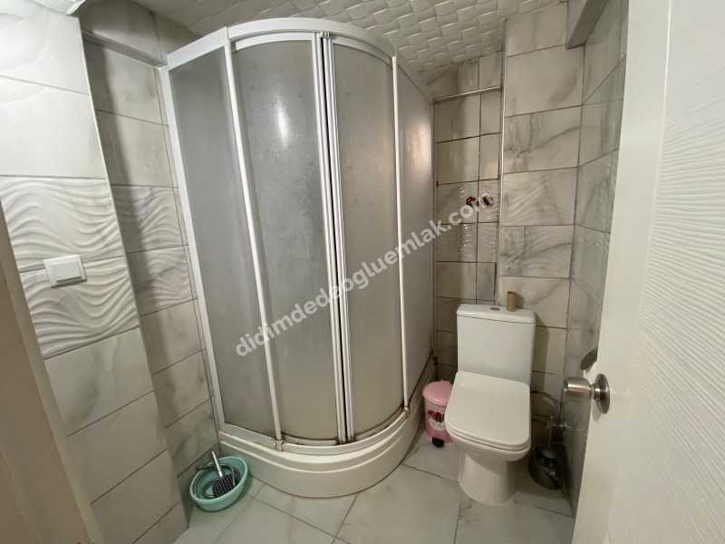 Didim Altınkum  Karakol caddesinde denize yürüme mesafesinde 2+1 daire