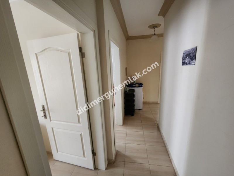 DİDİM ALTINKUM MAHALLESİ' NDE DENİZE YÜRÜME MESAFESİNDE 4 BALKONLU-PARK CEPHELİ  EŞYALI 2+1 SATILIK DAİRE