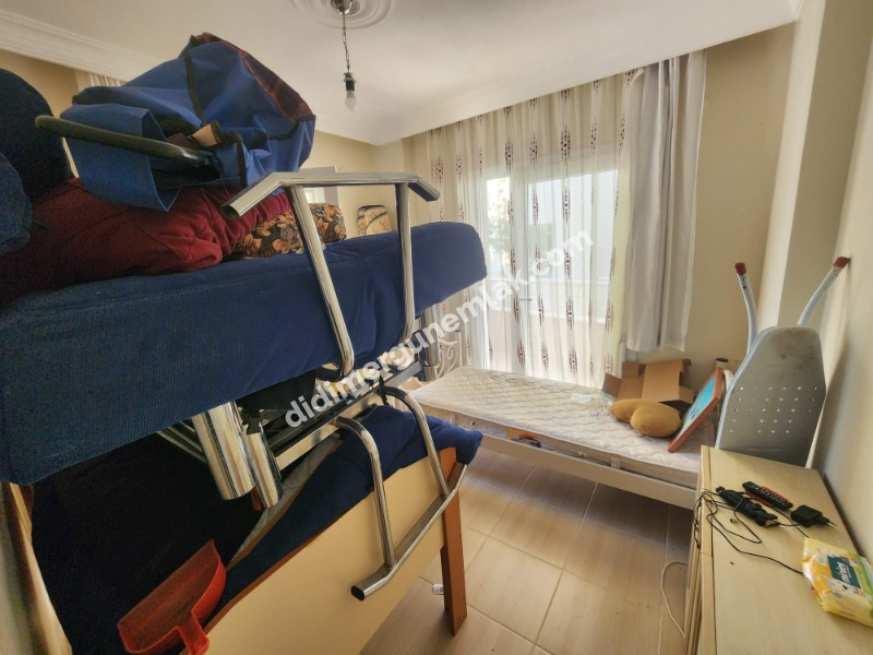 DİDİM ALTINKUM MAHALLESİ' NDE DENİZE YÜRÜME MESAFESİNDE 4 BALKONLU-PARK CEPHELİ  EŞYALI 2+1 SATILIK DAİRE