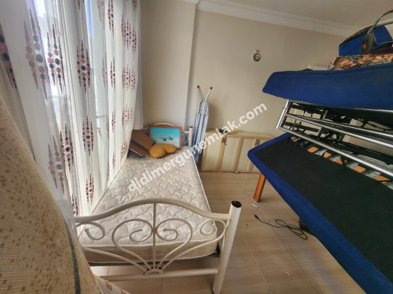 DİDİM ALTINKUM MAHALLESİ' NDE DENİZE YÜRÜME MESAFESİNDE 4 BALKONLU-PARK CEPHELİ  EŞYALI 2+1 SATILIK DAİRE