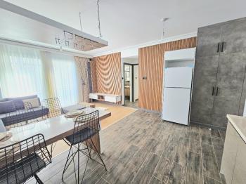 KKTC Girne Lapta'da Site İçerisinde Satılık 1+1 Yeni Eşyalı ve Kiracılı Daire