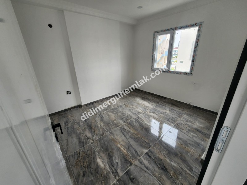 HİSAR MAHALLESİ’NDE 1+1 ARA KAT ­­­­| ARKA CEPHE SATILIK SIFIR DAİRE