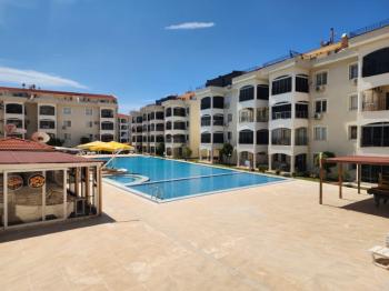 ÇAMLIK MAHALLESİ’NDE HAVUZLU SİTE İÇERİSİNDE 2+1 EŞYALI YÜKSEK ZEMİN KAT SATILIK DAİRE