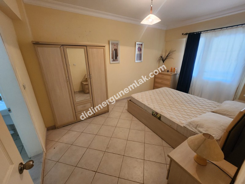 ÇAMLIK MAHALLESİ’NDE HAVUZLU SİTE İÇERİSİNDE 2+1 EŞYALI YÜKSEK ZEMİN KAT SATILIK DAİRE