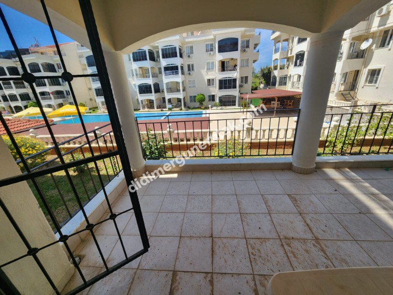 ÇAMLIK MAHALLESİ’NDE HAVUZLU SİTE İÇERİSİNDE 2+1 EŞYALI YÜKSEK ZEMİN KAT SATILIK DAİRE