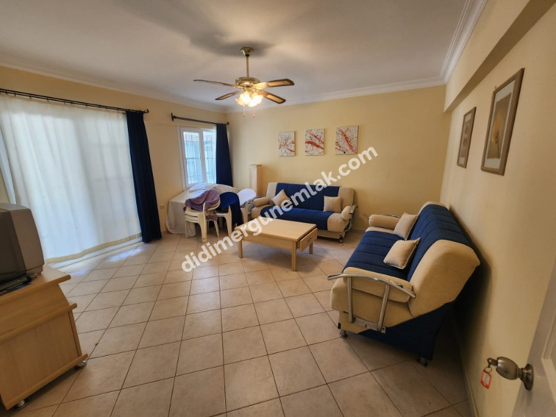 ÇAMLIK MAHALLESİ’NDE HAVUZLU SİTE İÇERİSİNDE 2+1 EŞYALI YÜKSEK ZEMİN KAT SATILIK DAİRE