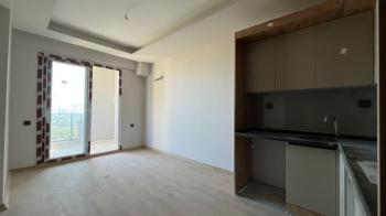 Elmas’tan Çeşmeli'de Yatırıma Uygun Sıfır Projede Deniz Manzaralı  1+1 