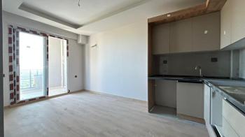 Elmas’tan Çeşmeli'de Yatırıma Uygun Sıfır Projede Deniz Manzaralı  1+1 