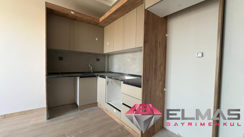 Elmas’tan Çeşmeli'de Yatırıma Uygun Sıfır Projede Deniz Manzaralı  1+1 