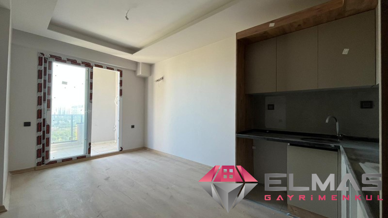 Elmas’tan Çeşmeli'de Yatırıma Uygun Sıfır Projede Deniz Manzaralı  1+1 