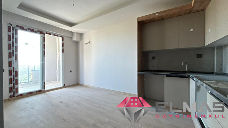Elmas’tan Çeşmeli'de Yatırıma Uygun Sıfır Projede Deniz Manzaralı  1+1 