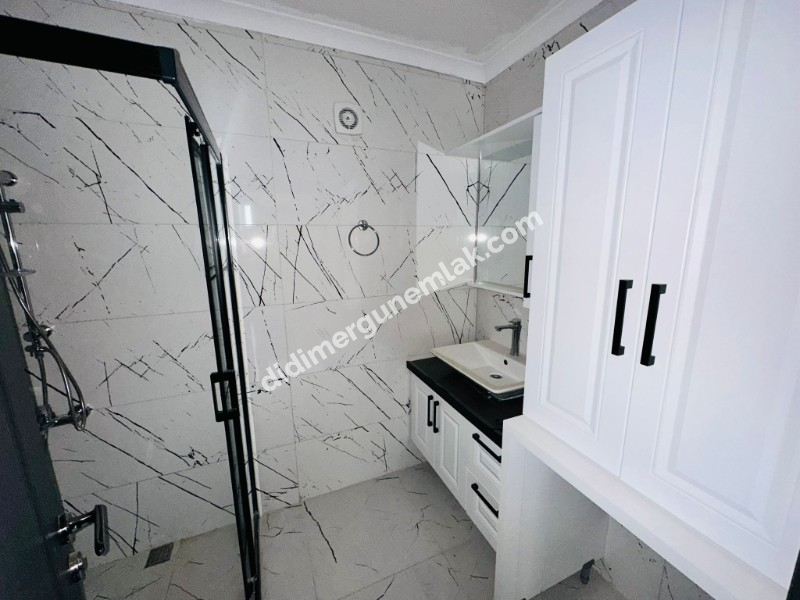 DİDİM CUMHURİYET MAHALLESİ’NDE ULTRA LÜKS, TATİL KÖYÜ KONFORUNDA 2+1 DAİRE