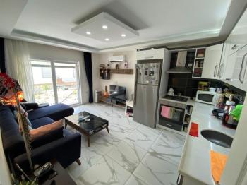 AKBÜK’TE HAVUZLU SİTE İÇERİSİNDE DENİZ MANZARALI 2+1 FIRSAT DAİRE!