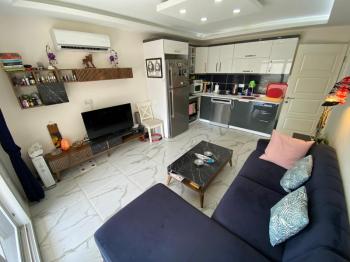AKBÜK’TE HAVUZLU SİTE İÇERİSİNDE DENİZ MANZARALI 2+1 FIRSAT DAİRE!