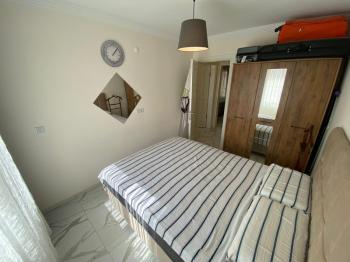AKBÜK’TE HAVUZLU SİTE İÇERİSİNDE DENİZ MANZARALI 2+1 FIRSAT DAİRE!